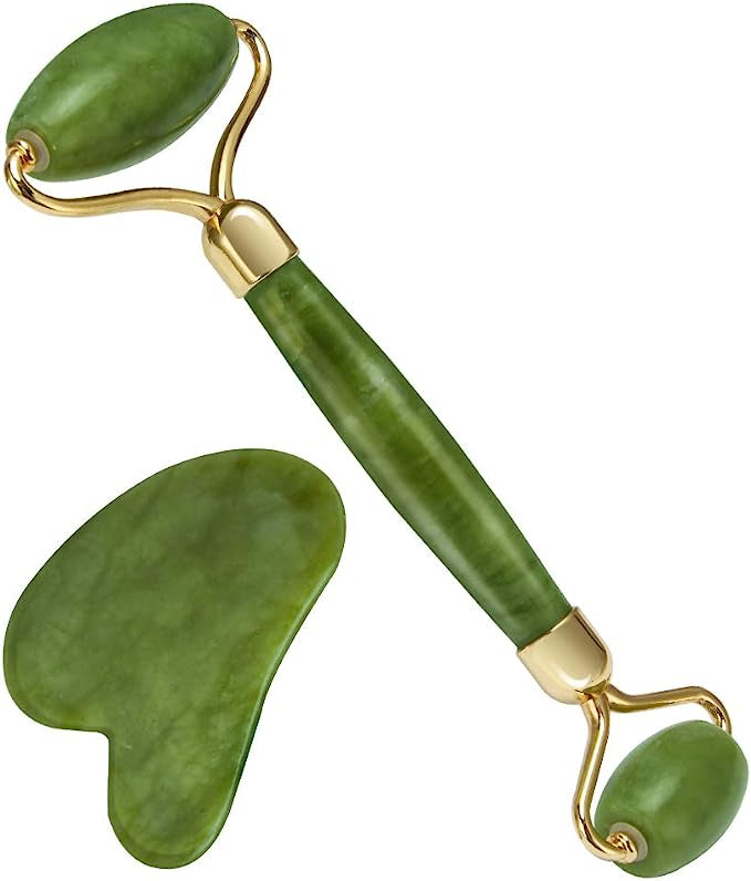 Flawless jade roller with marble stone for relaxing and glowing skin care routine.